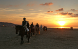 cavaliers sur la plage